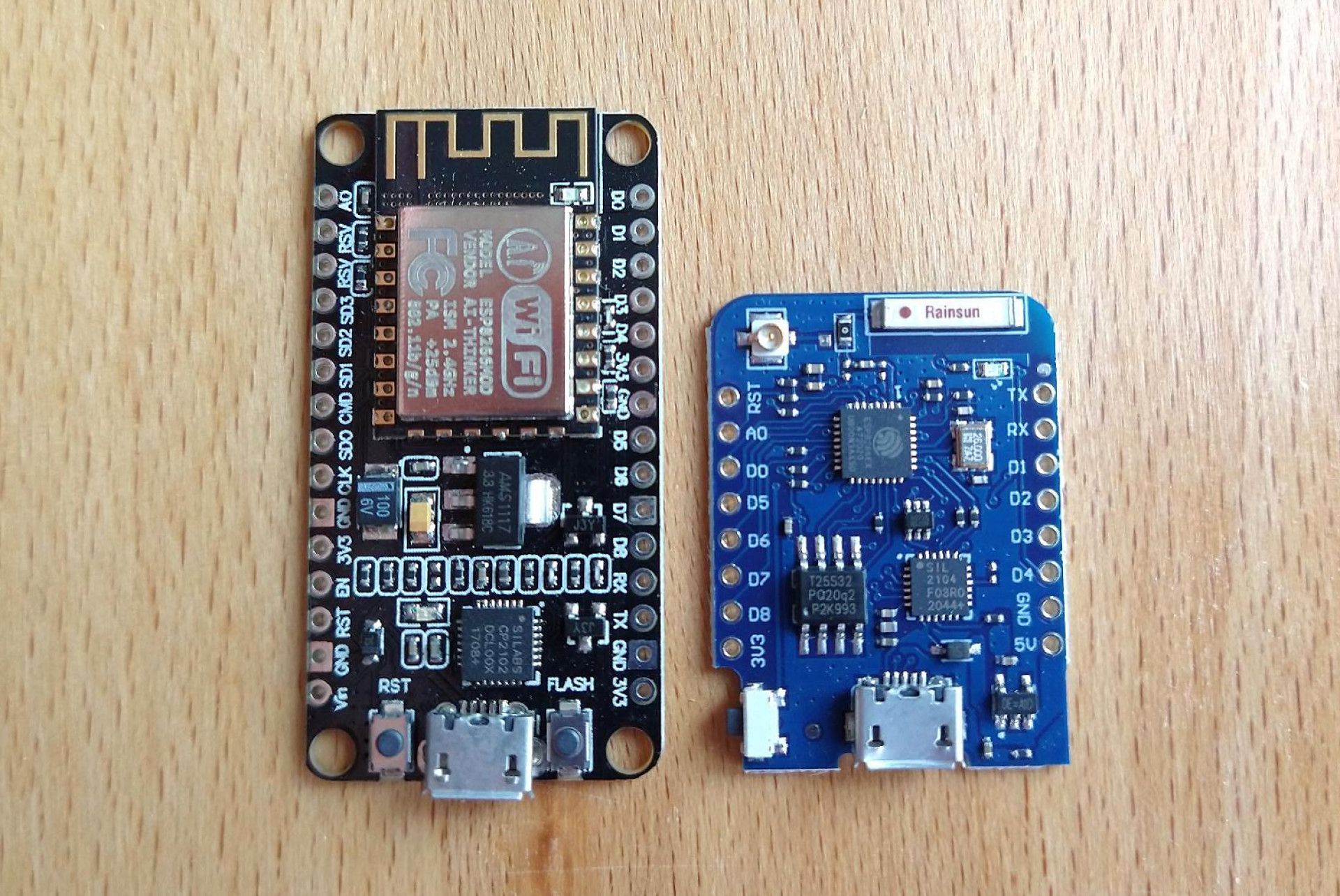 NodeMCU side by side with a D1 Mini Pro Board