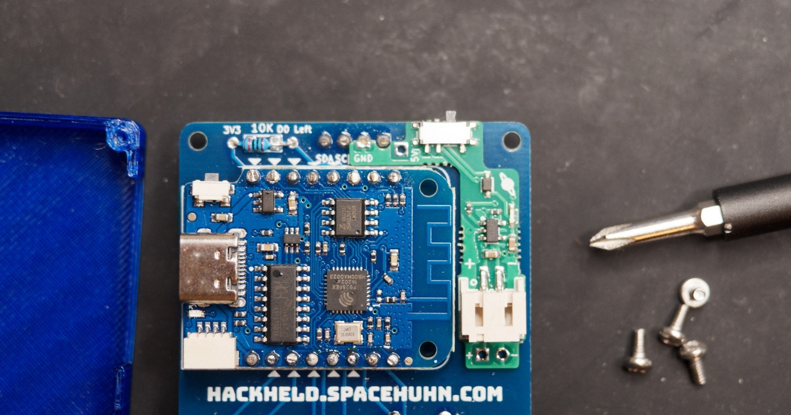 Battery mod placed on HackHeld