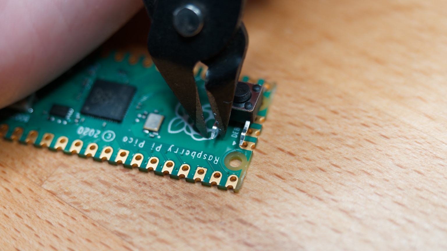 Cutting the legs of the push button