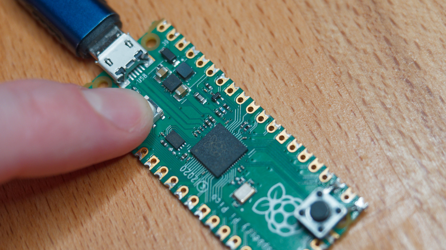 Holding boot button on Raspberry Pi Pico