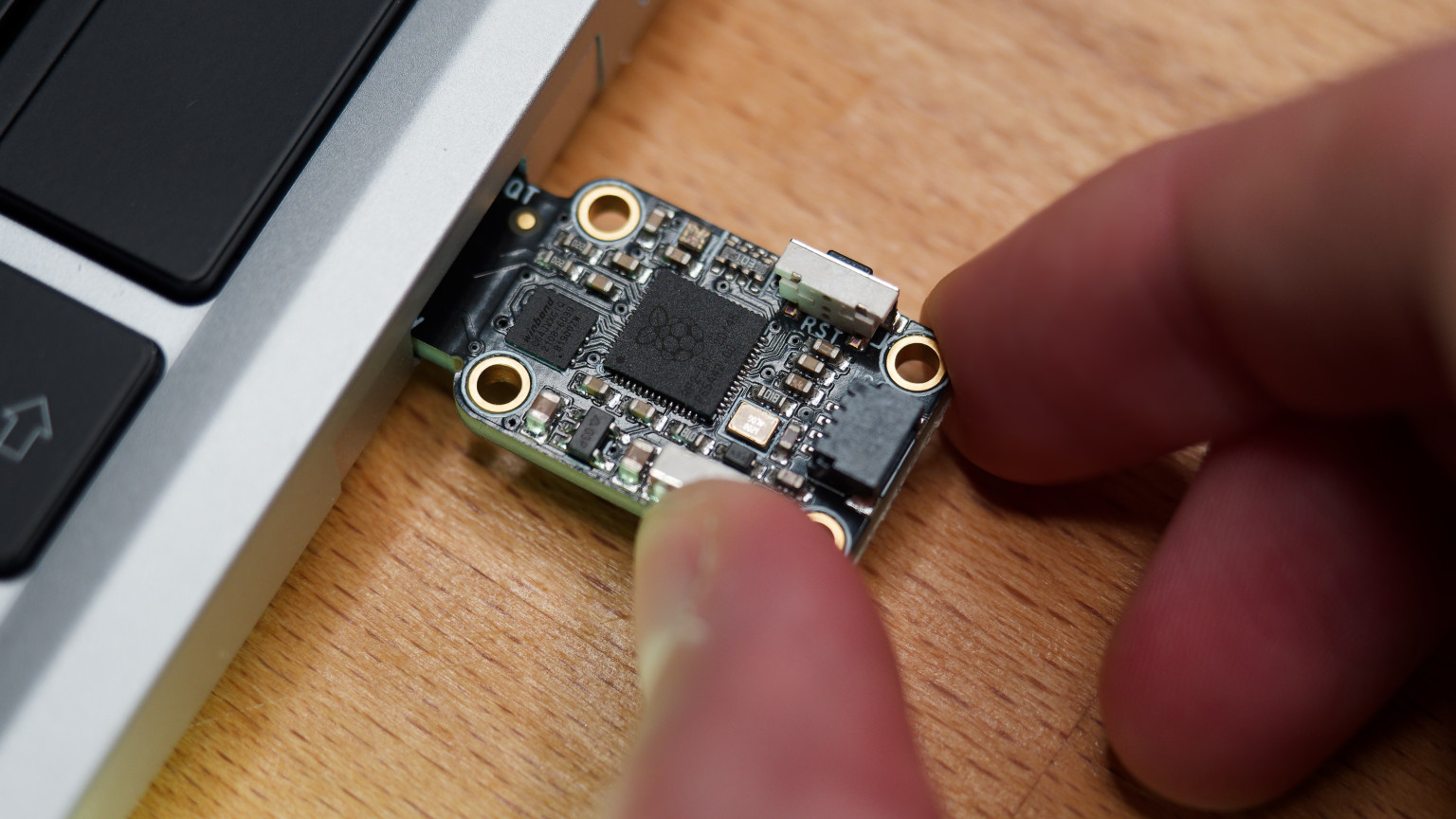 Adafruit Trinkey holding boot button